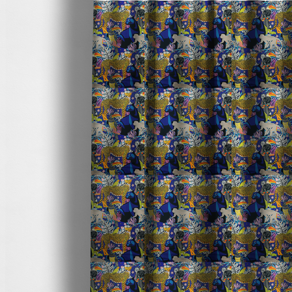 The fabric used to create these made-to-measure curtains is a vibrant jungle-themed fabric on a rich blue background featuring a repeating pattern of yellow leopards with black spots, blue panthers, toucans with bright orange and yellow beaks, light grey monkeys, small yellow-and-red birds, and lush tropical leaves and pink flowers.