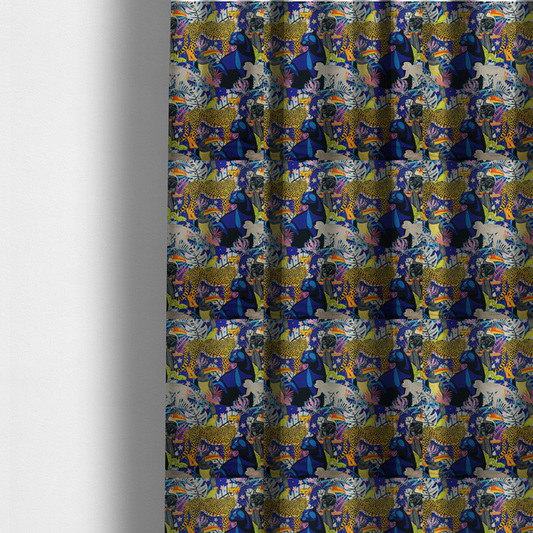 The fabric used to create these made-to-measure curtains is a vibrant jungle-themed fabric on a rich blue background featuring a repeating pattern of yellow leopards with black spots, blue panthers, toucans with bright orange and yellow beaks, light grey monkeys, small yellow-and-red birds, and lush tropical leaves and pink flowers.