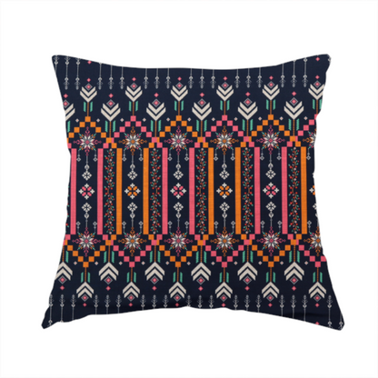 the fabric used to create this handmade cushion is a dark navy blue fabric featuring a repeating geometric pattern with rows of chevron arrows, starburst motifs, and vertical striped panels containing delicate floral vine designs in pink, orange, white, and turquoise.