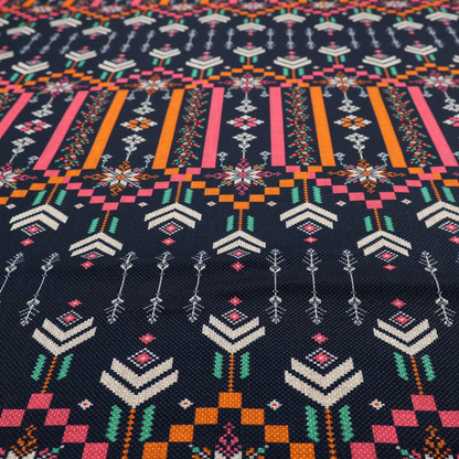 A dark navy blue fabric featuring a repeating geometric pattern with rows of chevron arrows, starburst motifs, and vertical striped panels containing delicate floral vine designs in pink, orange, white, and turquoise.