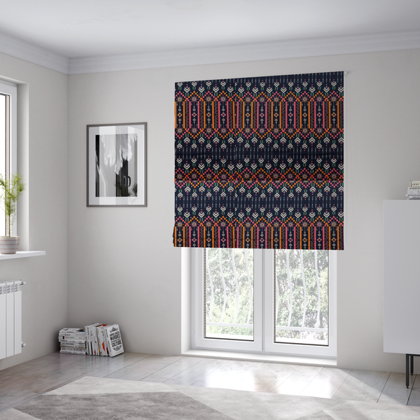The fabric used to create these Roman blinds is a dark navy blue fabric featuring a repeating geometric pattern with rows of chevron arrows, starburst motifs, and vertical striped panels containing delicate floral vine designs in pink, orange, white, and turquoise.