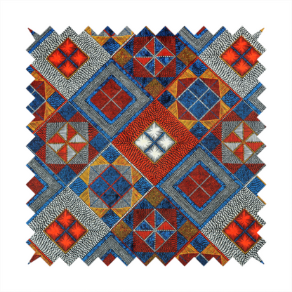 A geometric African wax print fabric featuring an intricate repeating pattern of nested diamonds, squares, and triangular motifs.