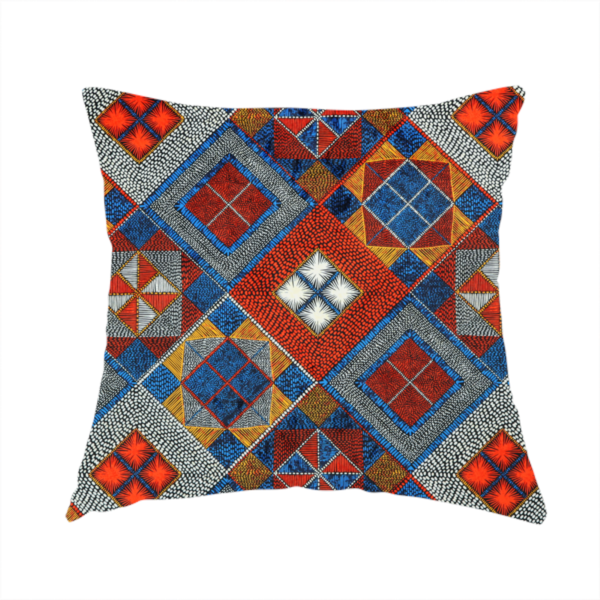 The fabric used to create this handmade cushion is a geometric African wax print fabric featuring an intricate repeating pattern of nested diamonds, squares, and triangular motifs.