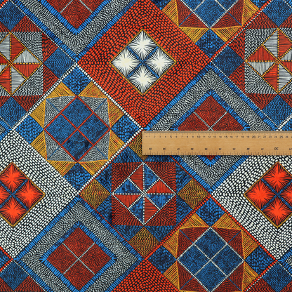 A geometric African wax print fabric featuring an intricate repeating pattern of nested diamonds, squares, and triangular motifs.