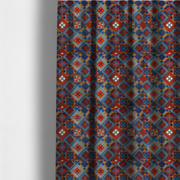 The fabric used to create these made-to-measure curtains is a geometric African wax print fabric featuring an intricate repeating pattern of nested diamonds, squares, and triangular motifs.