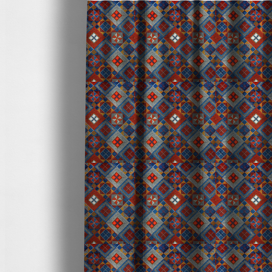 The fabric used to create these made-to-measure curtains is a geometric African wax print fabric featuring an intricate repeating pattern of nested diamonds, squares, and triangular motifs.