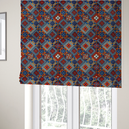 The fabric used to create these Roman blinds is a geometric African wax print fabric featuring an intricate repeating pattern of nested diamonds, squares, and triangular motifs.