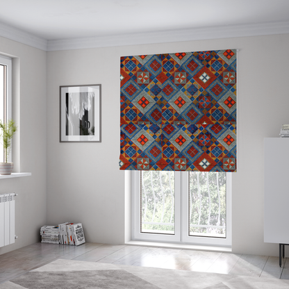 The fabric used to create these Roman blinds is a geometric African wax print fabric featuring an intricate repeating pattern of nested diamonds, squares, and triangular motifs.