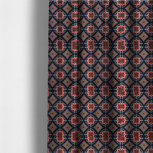 The fabric used to create these made-to-measure curtains is a repeating folk-art textile design featuring alternating rows of stylized pink floral blossoms and intricate diamond-shaped geometric motifs.