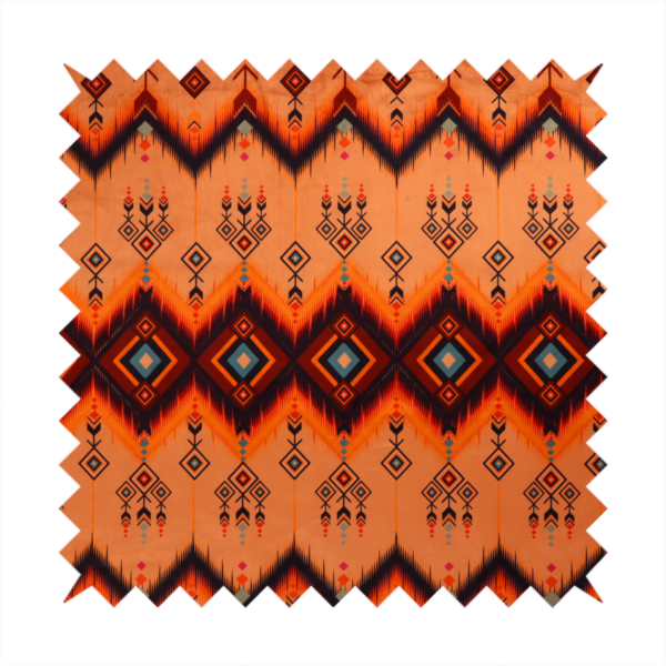 An Aztec-inspired tribal ikat fabric featuring horizontal bands of sharp zigzags and diamond motifs.