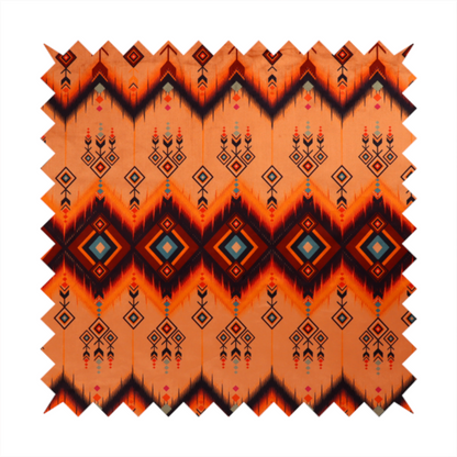 An Aztec-inspired tribal ikat fabric featuring horizontal bands of sharp zigzags and diamond motifs.