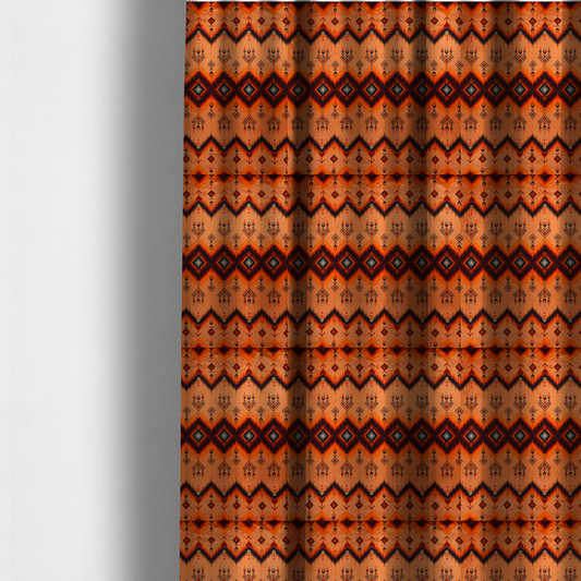 The fabric used to create these made-to-measure curtains is a Aztec-inspired tribal ikat fabric featuring horizontal bands of sharp zigzags and diamond motifs.