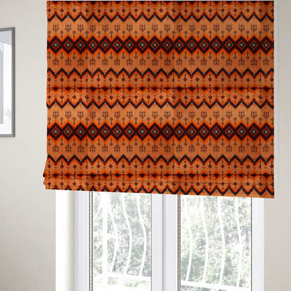 The fabric used to create these Roman blinds is an Aztec-inspired tribal ikat fabric featuring horizontal bands of sharp zigzags and diamond motifs.