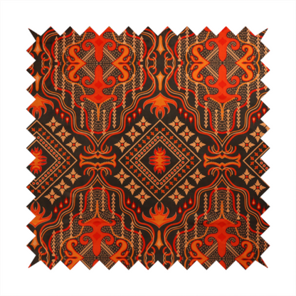 An ornate damask and tribal-inspired textile pattern featuring large symmetrical medallions interspersed with diamond shapes.