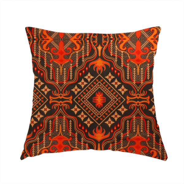 The fabric used to create this handmade cushion is an ornate damask and tribal-inspired textile pattern featuring large symmetrical medallions interspersed with diamond shapes.