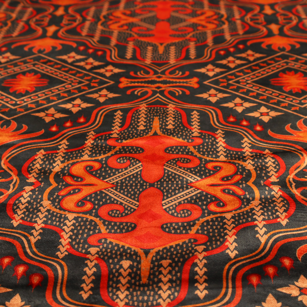 An ornate damask and tribal-inspired textile pattern featuring large symmetrical medallions interspersed with diamond shapes.