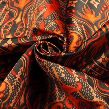 An ornate damask and tribal-inspired textile pattern featuring large symmetrical medallions interspersed with diamond shapes.