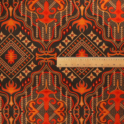 An ornate damask and tribal-inspired textile pattern featuring large symmetrical medallions interspersed with diamond shapes.