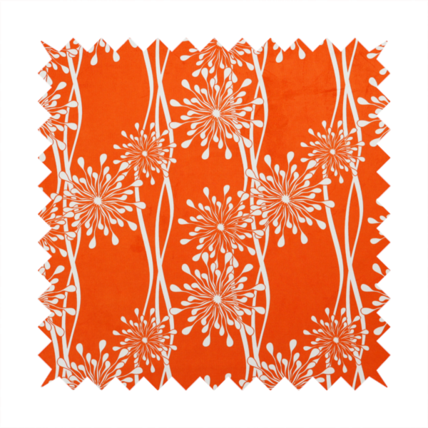 A modern botanical fabric featuring abstract, starburst floral or dandelion motifs paired with vertical wavy lines.