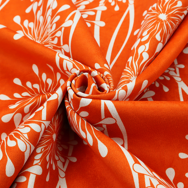 A modern botanical fabric featuring abstract, starburst floral or dandelion motifs paired with vertical wavy lines.
