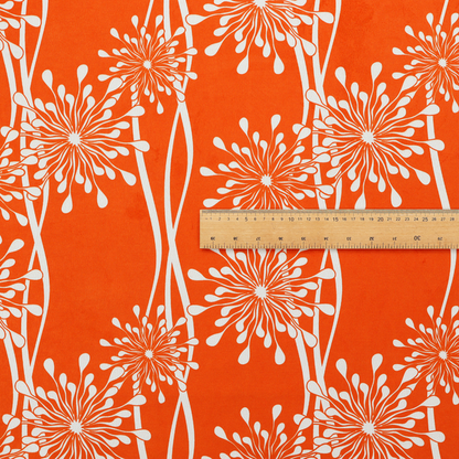 A modern botanical fabric featuring abstract, starburst floral or dandelion motifs paired with vertical wavy lines.