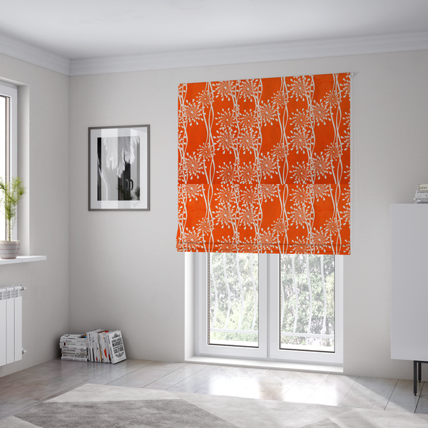 The fabric used to create these Roman blinds is a modern botanical fabric featuring abstract, starburst floral or dandelion motifs paired with vertical wavy lines.