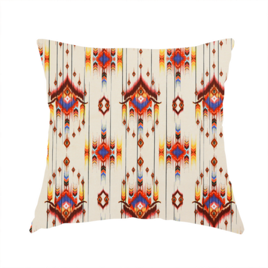 The fabric used to create this handmade cushion is an off-white fabric featuring a vibrant Southwestern Aztec and ikat-style geometric pattern.