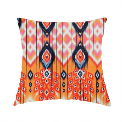 The fabric used to create this handmade cushion is a vibrant orange fabric featuring a bold Southwestern Aztec and ikat-style geometric pattern.