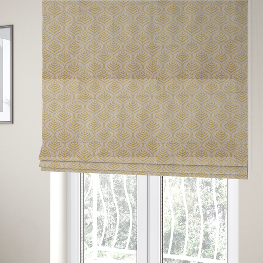 The fabric used to create these Roman blinds is a decorative, vintage-inspired textile pattern characterized by repeating ogival ogee arches filled with stylized leaf or feather motifs and dotted framing lines, rendered in gold or mustard yellow on a light neutral background.
