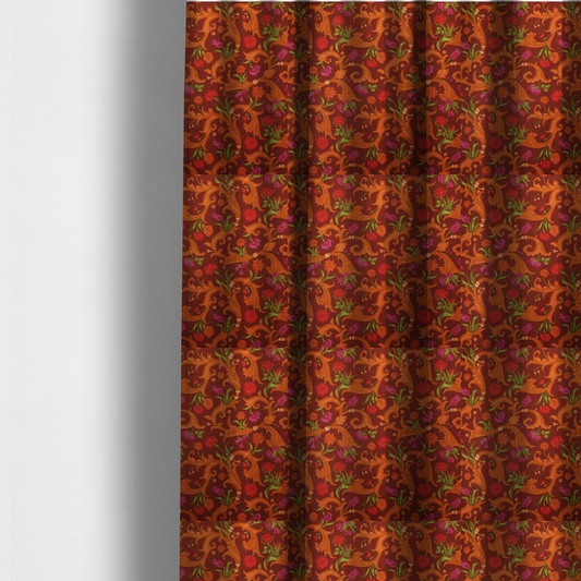 The fabric used to create these made-to-measure curtains is a repeating pattern of ornate, golden-orange baroque scrolls and acanthus leaves intermixed with detailed botanical elements including red roses, magenta tulips, and green foliage, all set against a deep crimson red background.