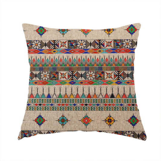 the fabric used to create this handmade cushion is a multi-coloured ethnic geometric fabric with repeating rows of colourful tribal diamonds, zigzags, and striped borders set against a light neutral background.