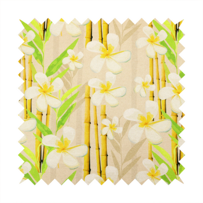 A tropical botanical fabric pattern with white plumeria blossoms featuring yellow centres, paired with green leaves and yellow bamboo stalks, set against a light beige background.