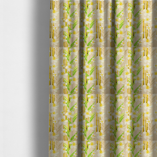 The fabric used to create these made-to-measure curtains is a tropical botanical fabric pattern with white plumeria blossoms featuring yellow centres, paired with green leaves and yellow bamboo stalks, set against a light beige background.