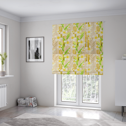 The fabric used to create these Roman blinds is a tropical botanical fabric pattern with white plumeria blossoms featuring yellow centres, paired with green leaves and yellow bamboo stalks, set against a light beige background.