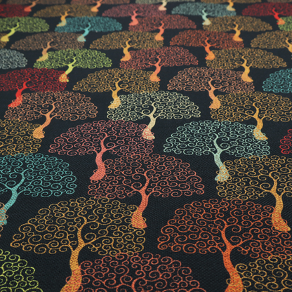 A colourful, intricately patterned tree crowns in shades of red, teal, gold, and green on a dark background.