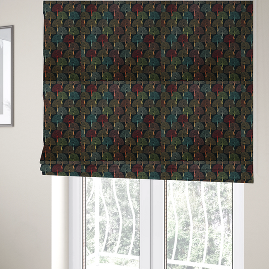 The fabric used to create these Roman blinds is a colourful, intricately patterned tree crowns in shades of red, teal, gold, and green on a dark background.