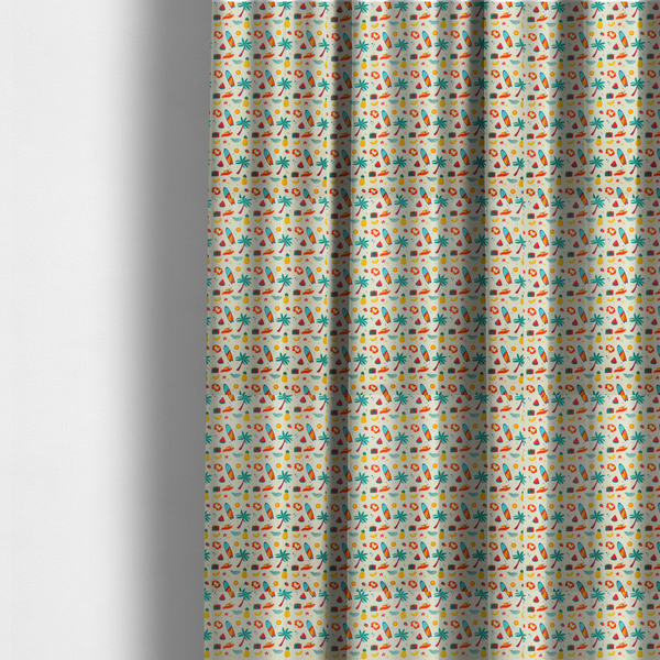 The fabric used to create these made-to-measure curtains is a playful summer pattern of surfboards, palm trees, pineapples, and cameras on a light background.