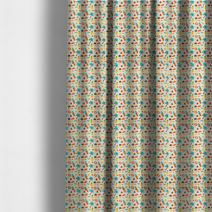 The fabric used to create these made-to-measure curtains is a playful summer pattern of surfboards, palm trees, pineapples, and cameras on a light background.