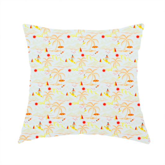 The fabric used to create this handmade cushion is a retro beach scene with surfers, palm trees, beach umbrellas, and sailboats on a light blue background.