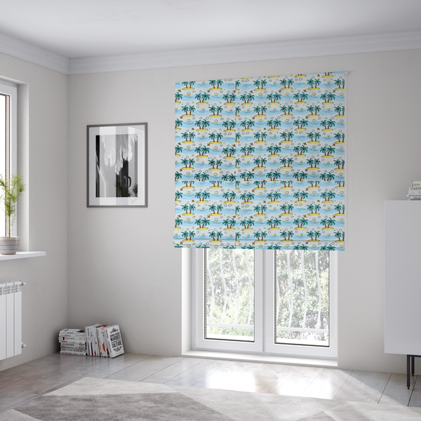 The fabric used to create these Roman blinds is a repeating pattern of cartoon tropical islands with palm trees, blue ocean waves, clouds, and suns on a light blue background.