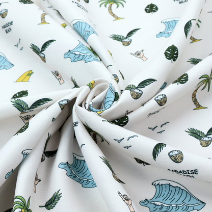 A playful pattern of ocean waves, palm trees, surfboards, and tropical leaves on a light background.
