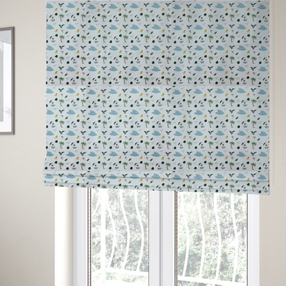 The fabric used to create these Roman blinds is a  playful pattern of ocean waves, palm trees, surfboards, and tropical leaves on a light background.