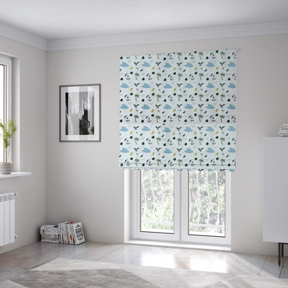 The fabric used to create these Roman blinds is a  playful pattern of ocean waves, palm trees, surfboards, and tropical leaves on a light background.