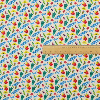 A vibrant, repeating beach-themed pattern on a light cream background, featuring small illustrations of blue and white surfboards, red buckets, green swim flippers, sunglasses, yellow sunhats, starfishes, and popsicles.