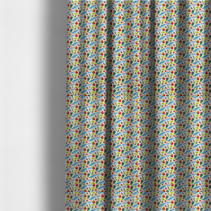 The fabric used to create these made-to-measure curtains is a vibrant, repeating beach-themed pattern on a light cream background, featuring small illustrations of blue and white surfboards, red buckets, green swim flippers, sunglasses, yellow sunhats, starfishes, and popsicles.