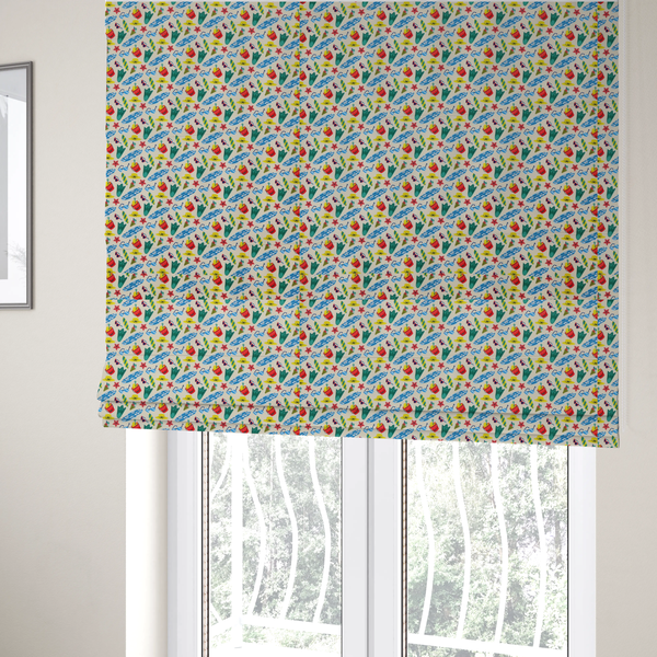 The fabric used to create these Roman blinds is a vibrant, repeating beach-themed pattern on a light cream background, featuring small illustrations of blue and white surfboards, red buckets, green swim flippers, sunglasses, yellow sunhats, starfishes, and popsicles.