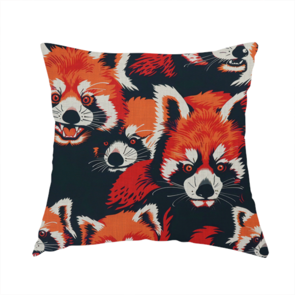 The fabric used to create this handmade cushion is a stylized, vibrant red pandas with white and black facial markings against a dark navy blue background.