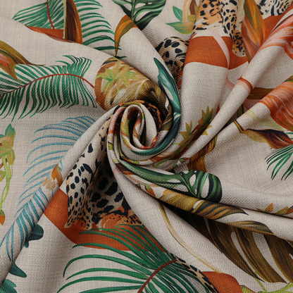 Fabric pattern featuring lounging leopards surrounded by vibrant tropical leaves, monstera fronds, and vines on a light-coloured background.