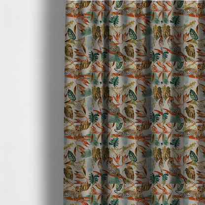 The fabric used to create these made-to-measure curtains is a lounging leopards surrounded by vibrant tropical leaves, monstera fronds, and vines on a light-coloured background.