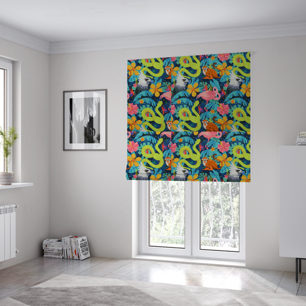 The fabric used to create these Roman blinds has neon green snakes, orange monkeys, pink flamingos, and harpy eagles surrounded by tropical flowers and blue foliage on a dark blue background.